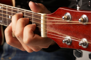 music-guitar-being-played-closeup-2