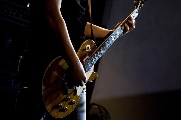 band_electric_guitar_being_played_45_degree_angle-2 band_electric_guitar_being_played_45_degree_angle-2